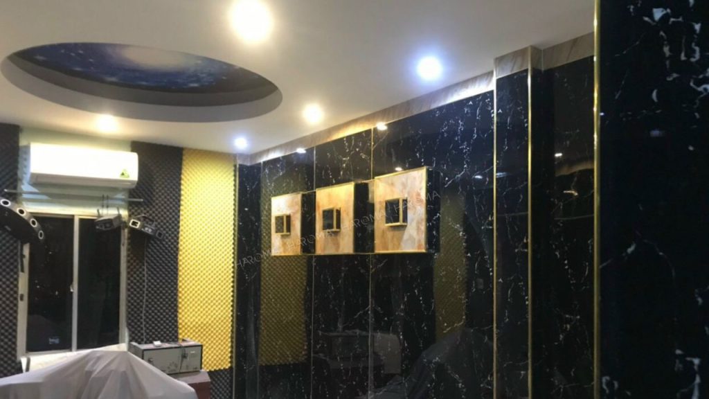 Tấm PVC vân đá dát vàng đen sang trọng
