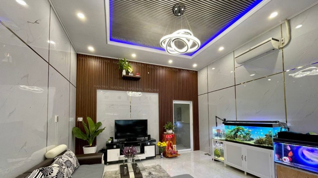 Thi công lam sóng kết hợp PVC vân đá trang trí phòng khách